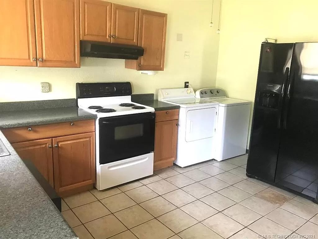 Range, hood, washer, dryer and refrigerator, 2021.